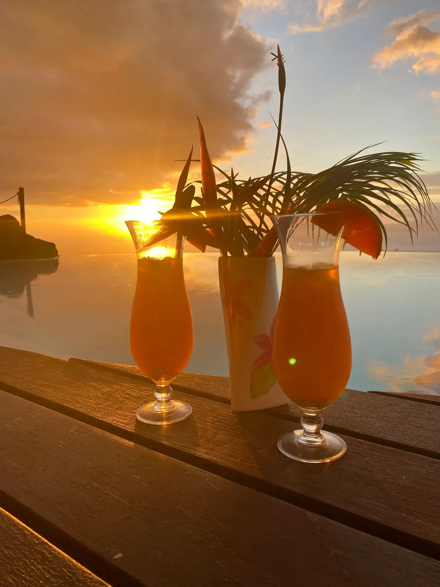 Tropical cocktails at sunset over the lagoon