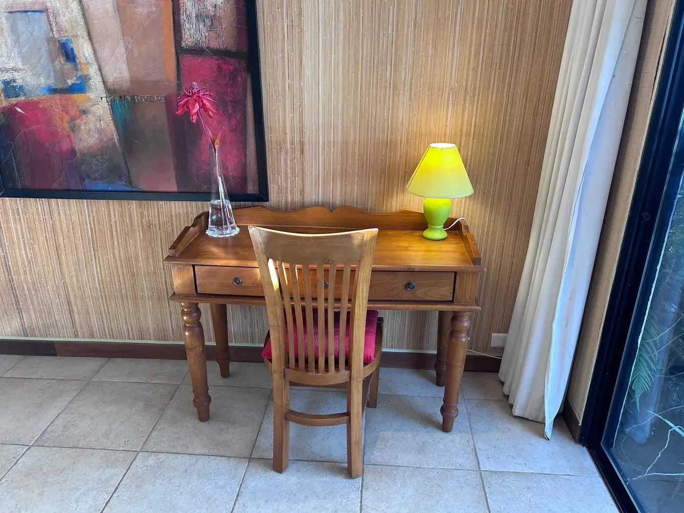Master bedroom desk with tiaré blossoms at Villa Paradise Tahiti