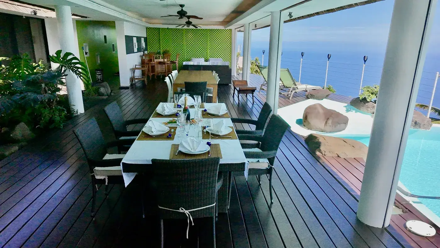 Aerial view of the open-plan dining and living area at Villa Paradise Tahiti