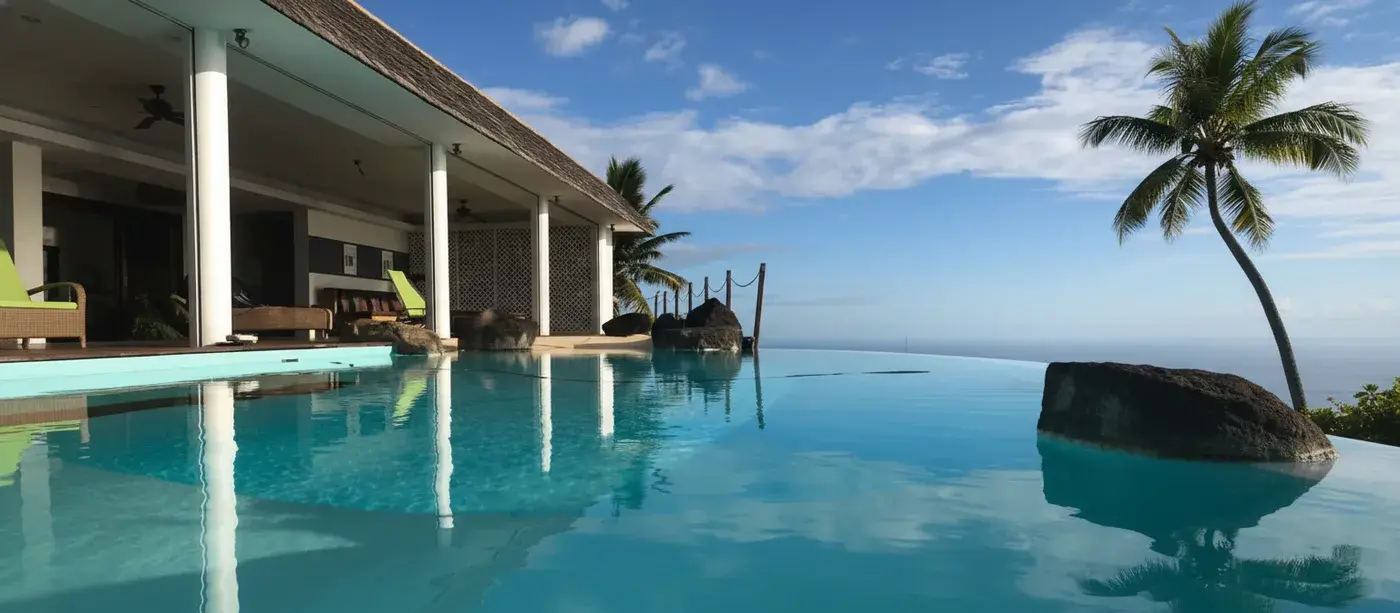 Panoramic view of the infinity pool deck at Villa Paradise Tahiti